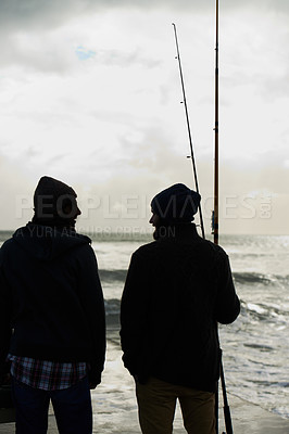 Buy stock photo Fishing, fisherman and men by ocean talking with rod, reel and equipment to catch fish for hobby. Friends, sports and people cast line for adventure on holiday, vacation or weekend together in nature