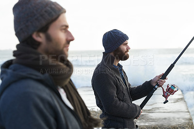 Buy stock photo People, fishing and friends for bonding at beach, relaxing and casting a line by ocean waves. Men, fisherman and together on vacation or holiday, hobby and gear by water and support on adventure