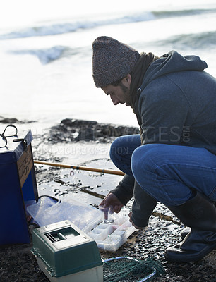 Buy stock photo Cold, gear and beach with fisherman, cooler box and hobby with equipment and weekend break. Person, ocean and guy with tools for activity and early morning with waves, shore and seaside with vacation