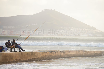 Buy stock photo Fishing, fisherman and people on pier by ocean with rod, reel and equipment to catch fish for hobby. Nature, sports and friends cast line for recreation or adventure on holiday, vacation and weekend