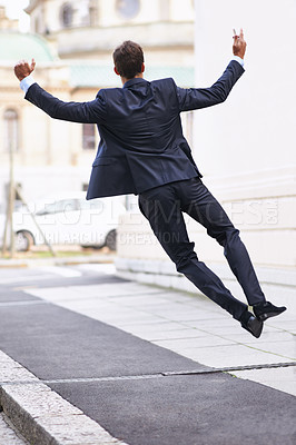 Buy stock photo Business, excited and man jump with phone in city street celebration for wow, news or winner fist gesture. Smartphone, energy or entrepreneur back with app alert for online competition prize or lotto