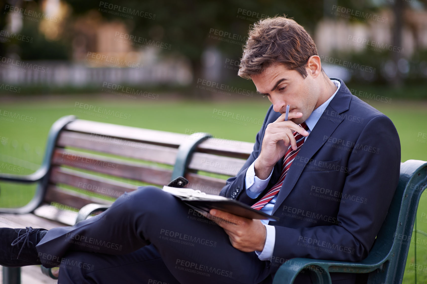 Buy stock photo Thinking, business man and notebook at park bench for opportunity, dream or vision for remote work. Journal, idea or consultant outdoor with decision, inspiration and serious employee planning future