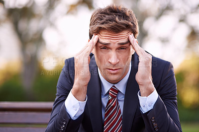 Buy stock photo Portrait, stress and businessman with headache at park outdoor, financial crisis or frustrated at challenge. Face, migraine and professional massage temple, pain and anxiety for mistake of lawyer