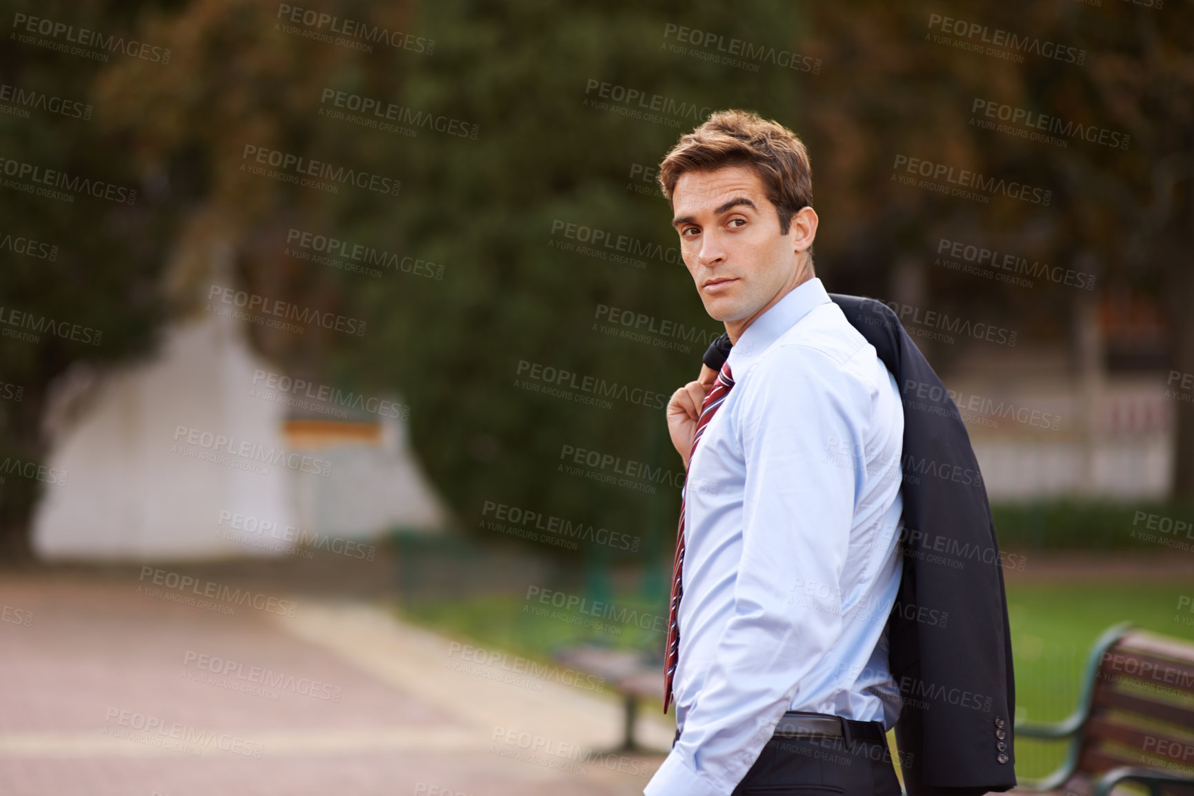 Buy stock photo Jacket over shoulder, business and man in a park, confident and walking with professional and thinking. City, outdoor and employee with suit and decision with daydreaming and person with a choice