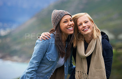 Buy stock photo Two happy young women smiling on the beach