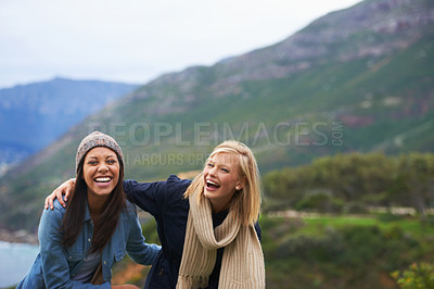 Buy stock photo Friends, laugh and women on mountain happy for adventure on holiday, vacation and weekend outdoors. Nature, travel and people by seaside for hike, funny joke and bonding together in countryside