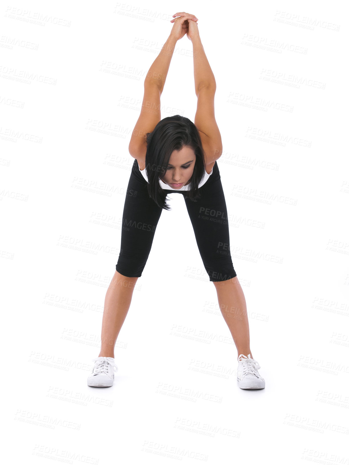 Buy stock photo A young woman stretching her arms behind her back