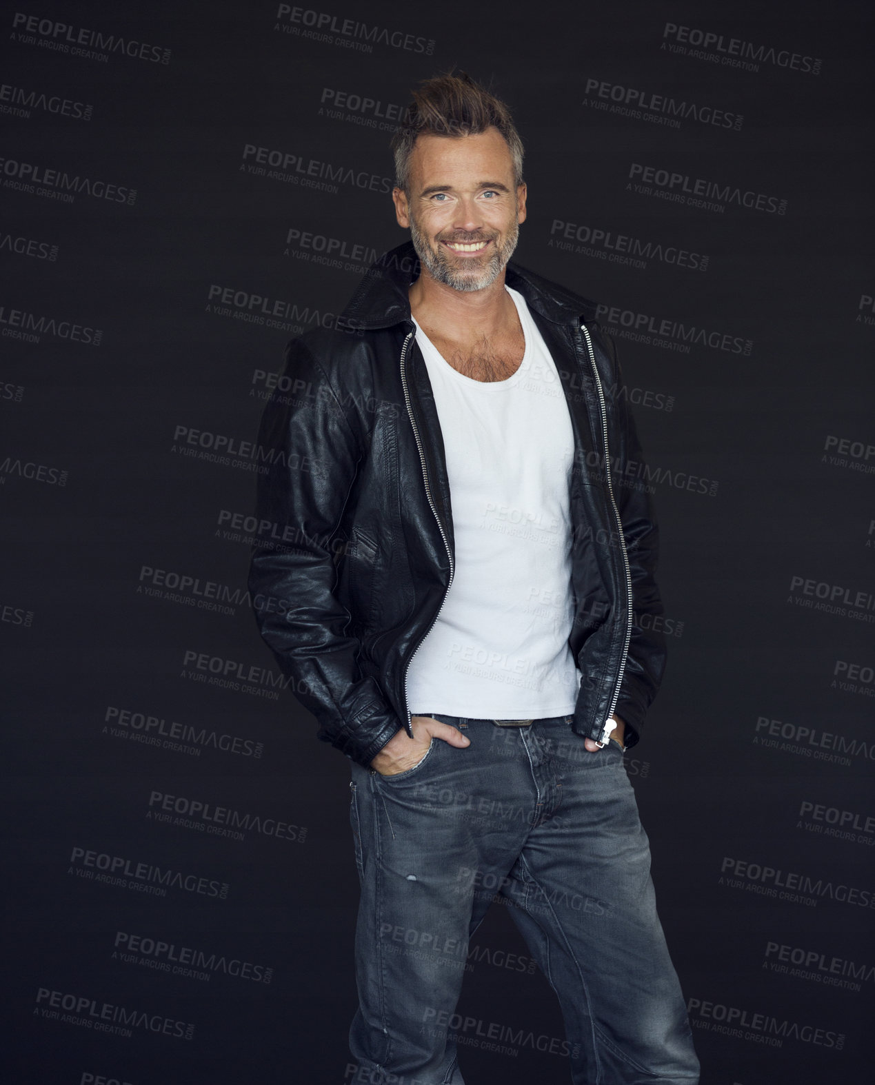 Buy stock photo Mature man, leather jacket and studio portrait with smile, pride and confidence by black background. Edgy fashion, biker or rock aesthetic with happy male model with jeans, clothes and trendy style