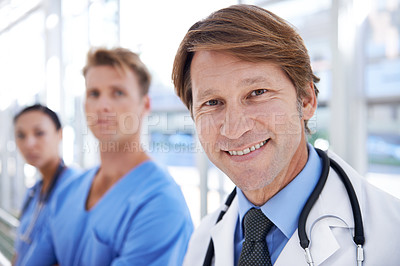 Buy stock photo Healthcare team, doctors and portrait of man in hospital for medical service, insurance and support. Professional nurses, clinic and happy men and women for collaboration, consulting and medicine