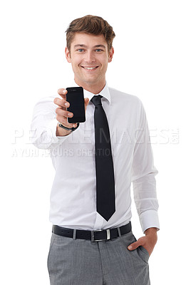 Buy stock photo Studio portrait of a handsome young business professional displaying a blank cellphone screen to the camera