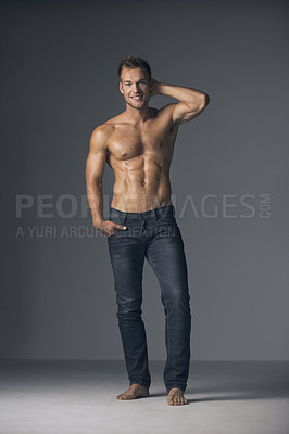 Buy stock photo Muscle, body and portrait of man with abs in studio for fashion, confident and cool on wall background. Topless, abs and male fitness model posing in denim, jeans and confidence, sixpack or aesthetic