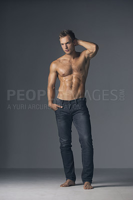Buy stock photo Sexy model, shirtless and a man in fashion jeans for fashionable, stylish and trendy aesthetic. Topless, serious and a person modeling pants or trendy clothes with confidence on a studio background