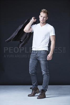 Buy stock photo Fashion, stylish and a thinking man in jeans with confidence, style and edgy aesthetic. Sexy, cool and a fashionable model in trendy clothes with an idea isolated on a black background in a studio