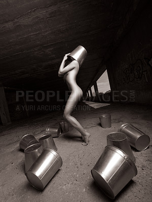 Buy stock photo Naked woman hiding her head in a bucket