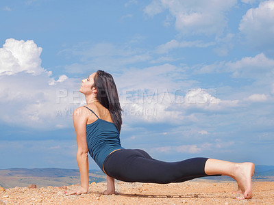 Buy stock photo Woman, yoga and stretching on mountain or peace as wellness zen or outdoor nature, pilates or blue sky. Female person, relax and countryside in America or mindfulness practice, balance or performance