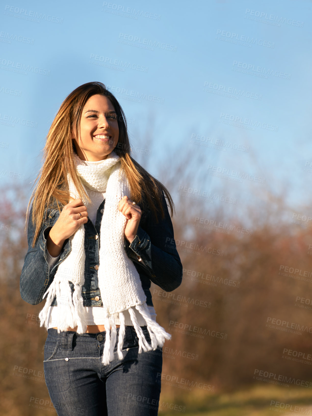 Buy stock photo Shot of a beautiful young woman enjoying a day outdoors