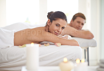 Buy stock photo A happy couple relaxing together at a spa