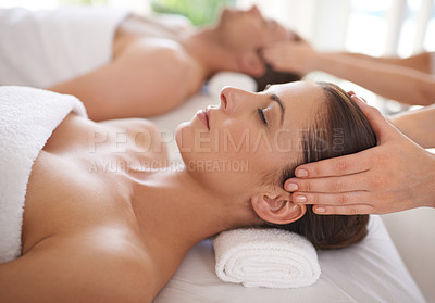 Buy stock photo Couple, massage and hands on head in spa to relax with luxury treatment for wellness on holiday or vacation. Beauty, care and calm people together in hotel or resort for healthy facial or skincare