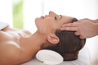 Buy stock photo Head, massage and hands on woman in spa to relax on table for skin care, treatment or facial. Beauty, person and calm girl in luxury salon or resort on holiday or vacation with health and wellness