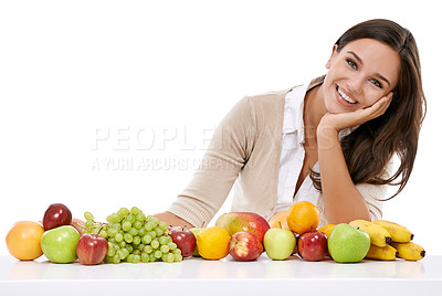 Buy stock photo Woman, face and smile for fruit on table, breakfast nutrition, healthy diet and vitamins motivation in studio. Person, happy  and food nutritionist, natural fibre and organic food for body healthcare