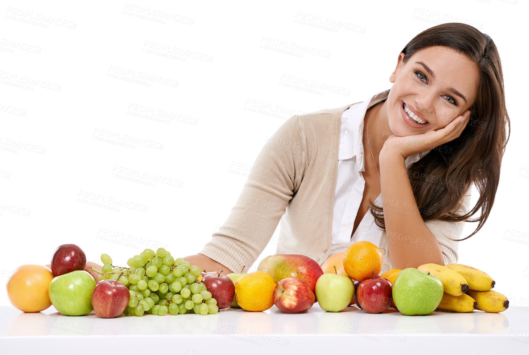 Buy stock photo Woman, face and smile for fruit on table, breakfast nutrition, healthy diet and vitamins motivation in studio. Person, happy  and food nutritionist, natural fibre and organic food for body healthcare