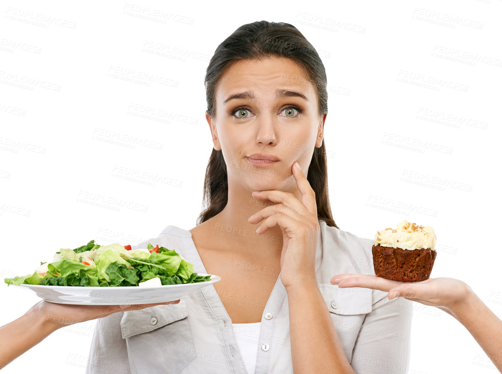 Buy stock photo Woman thinking of diet with salad or cake isolated on white background in healthy, vegan or detox choice. Hand holding chocolate cupcake, green vegetables and confused model with decision in portrait