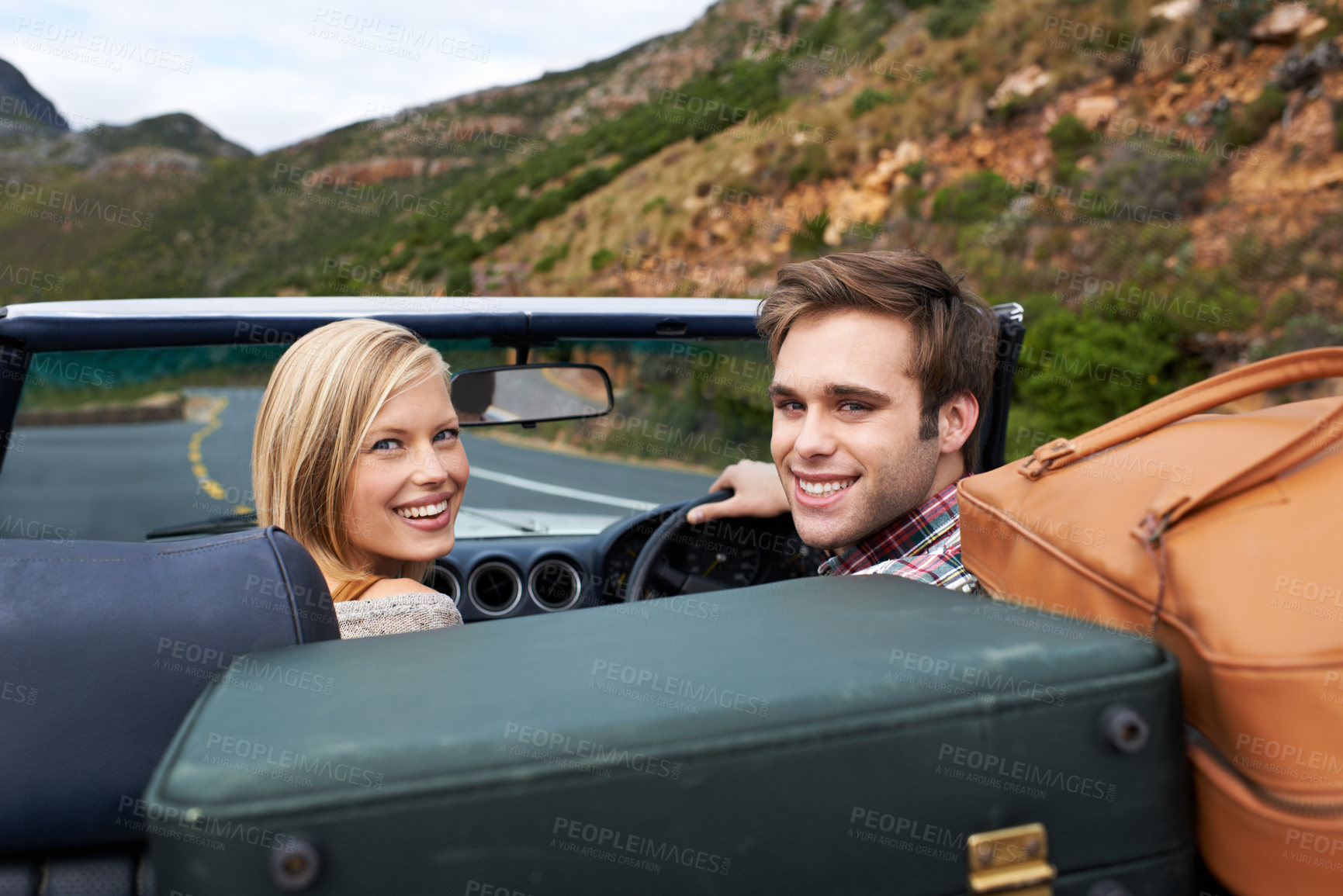 Buy stock photo Suitcases, driving and portrait of couple in a car for travel to vacation, adventure or holiday destination. Happy, love and young man and woman on journey in vehicle for weekend road trip together.