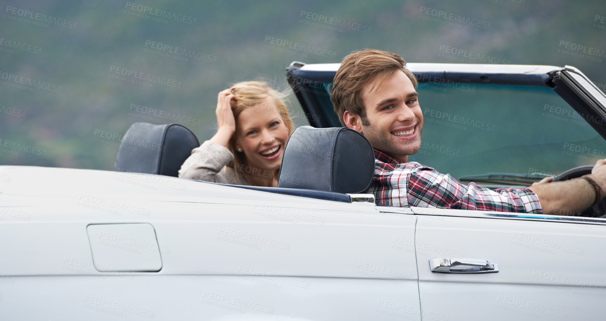 Buy stock photo Couple, portrait and convertible driving on road or adventure in California or outdoor, journey or vacation. Man, woman and environment in nature or relaxing trip with transport, weekend or happy