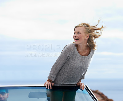 Buy stock photo Happy, blue sky and convertible car with woman on road trip for travel, vacation or holiday in summer. Space, smile and journey with young person driving in vehicle for transport in fresh air