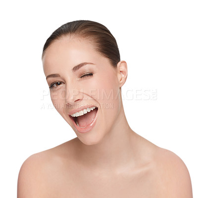 Buy stock photo Portrait, happy and woman wink for skincare, flirt or natural beauty isolated on white studio background. Face, blink and smile of model in cosmetics excited for spa facial treatment for healthy skin