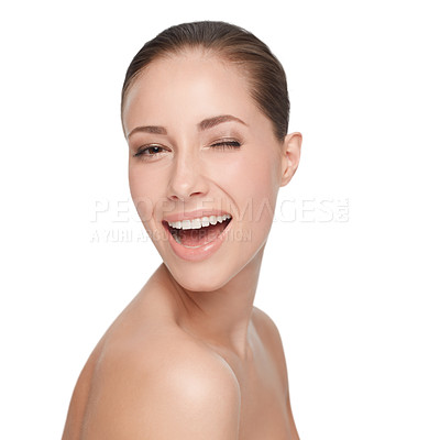 Buy stock photo Portrait, happy and woman wink for skincare, flirt or beauty isolated on white studio background. Face, blink and smile of model in makeup cosmetics excited for spa facial treatment for healthy skin
