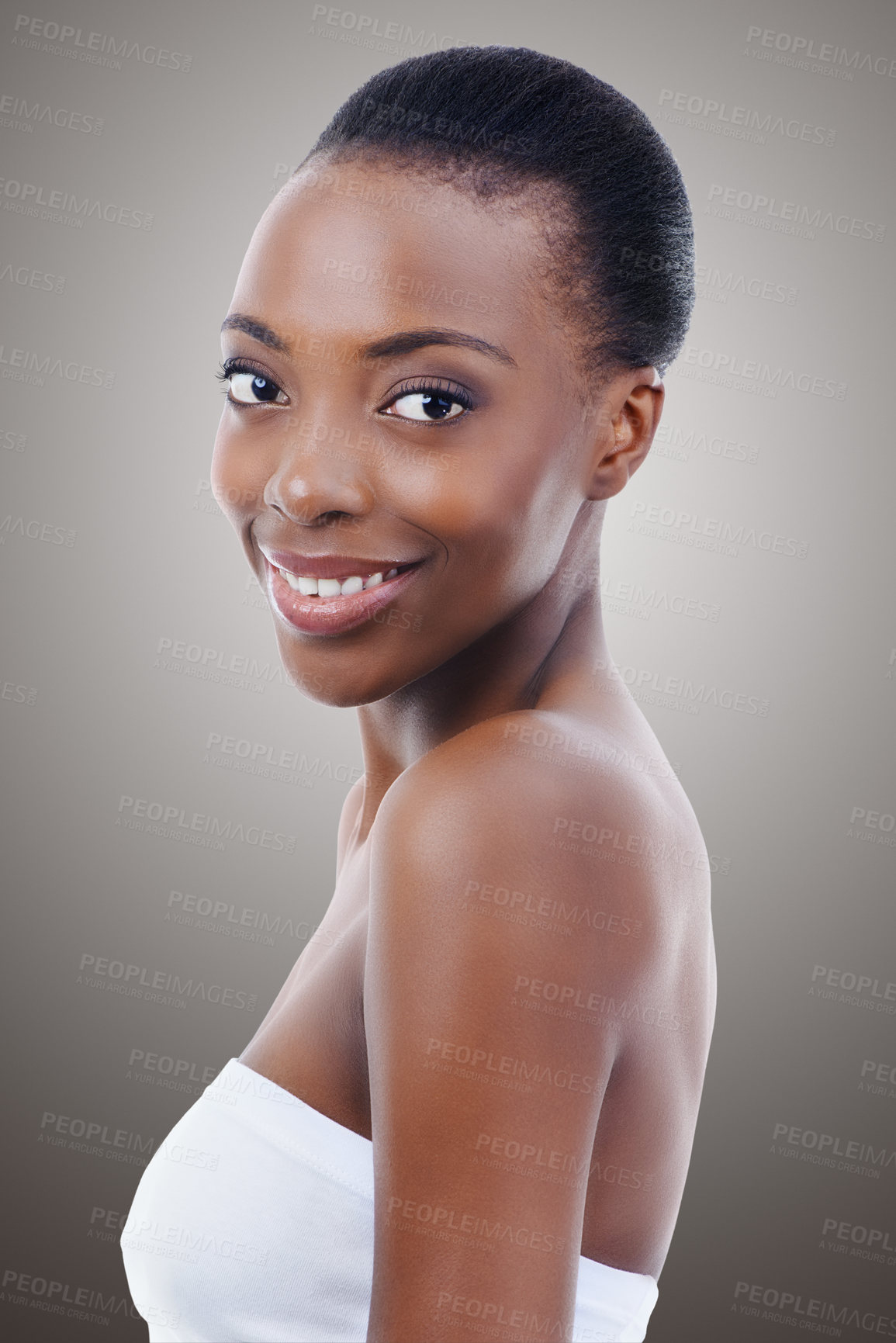Buy stock photo Skincare, dermatology and portrait of black woman in studio with smile, natural makeup or facial glow. Cosmetics, beauty and face of happy girl on grey background for healthy skin, shine or wellness.