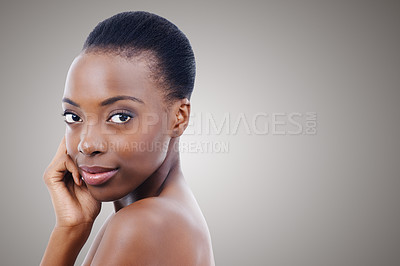 Buy stock photo Mockup, cosmetics and portrait of black woman in studio with beauty, natural makeup or facial glow. Skincare, dermatology or face of girl on grey background space for healthy skin, shine or wellness