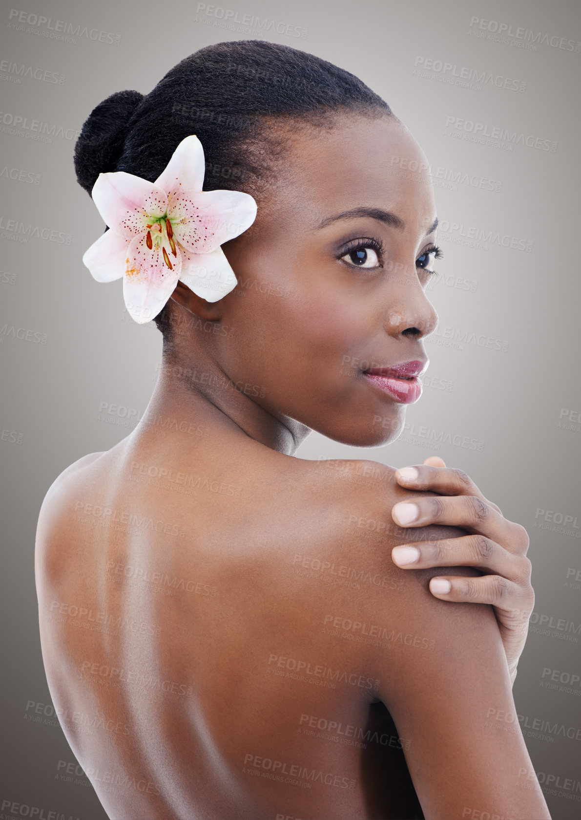 Buy stock photo Natural, beauty and black woman with flower on gray background for wellness, cosmetics and makeup. Dermatology mockup, salon and face of person for aesthetic, skincare products and facial in studio