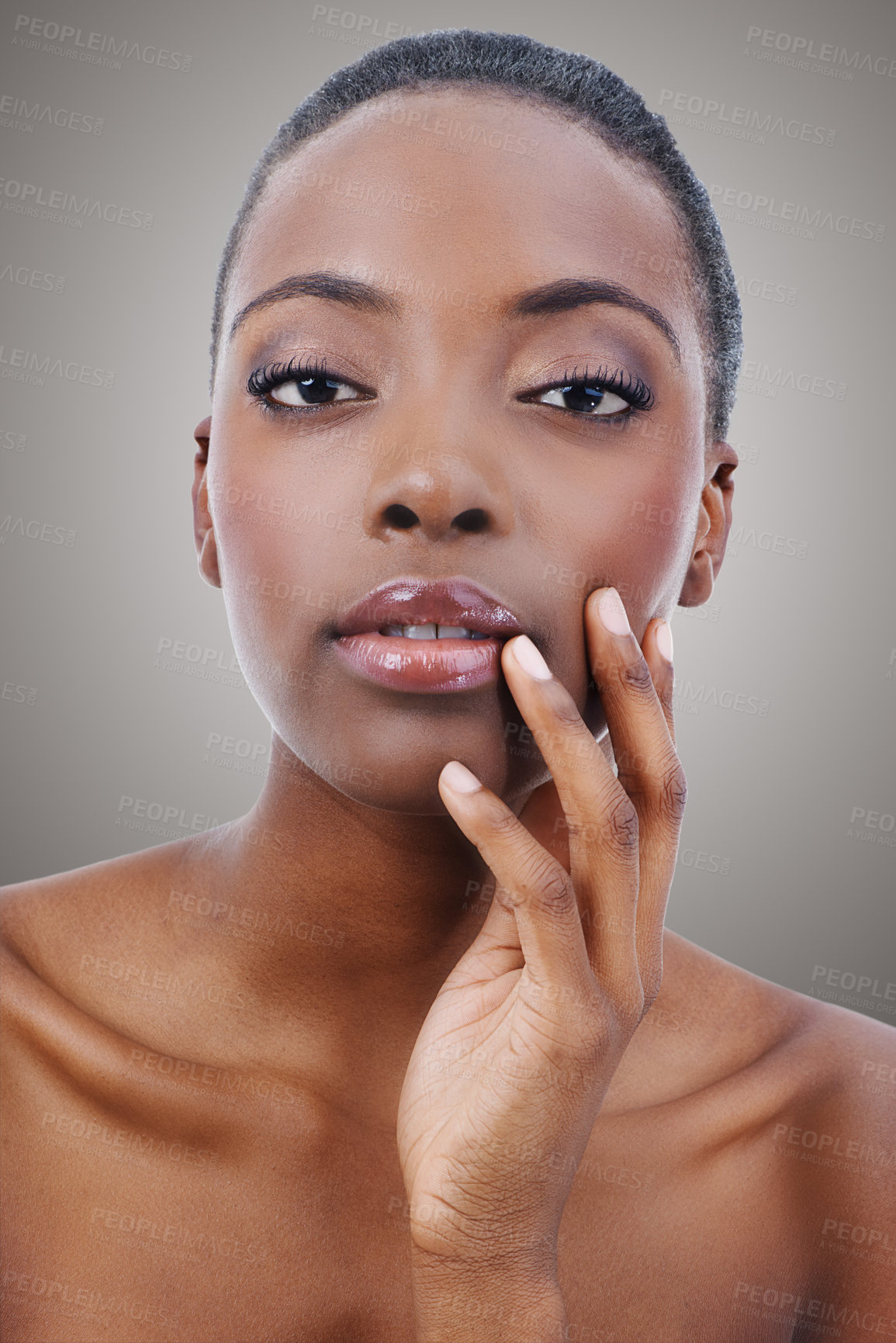 Buy stock photo Beauty, portrait and black woman with makeup and skincare in studio, background or salon. Nails, facial and African model with healthy natural glow on skin and hand from cosmetics or dermatology