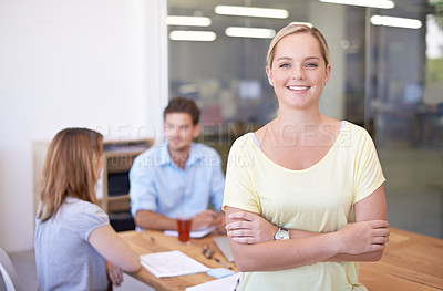 Buy stock photo Meeting, teamwork and portrait of woman with arms crossed in business with confidence in office. People, talking and collaboration on project, review and discussion with paperwork in startup 