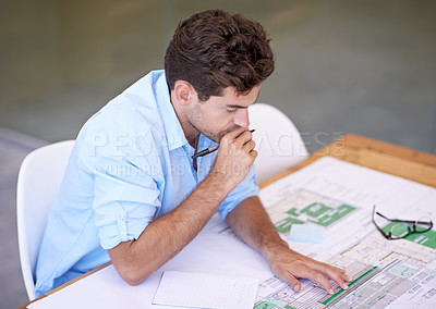 Buy stock photo Architect, thinking or man in office with blueprint, brainstorming and reading paper for building project. Designer, engineer or creative developer at desk with floor plan for remodeling upgrade.