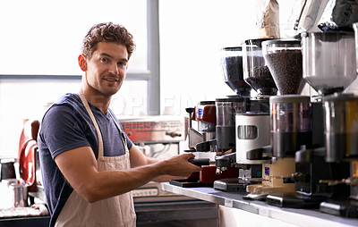 Buy stock photo Portrait of a young male barista in a coffee shop