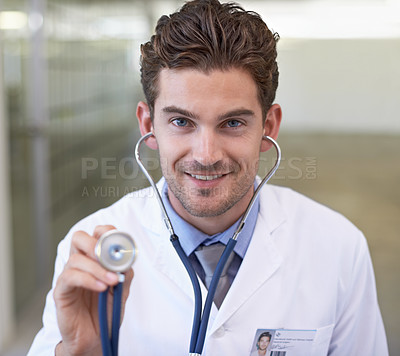 Buy stock photo Cropped shot of a handsome young doctor