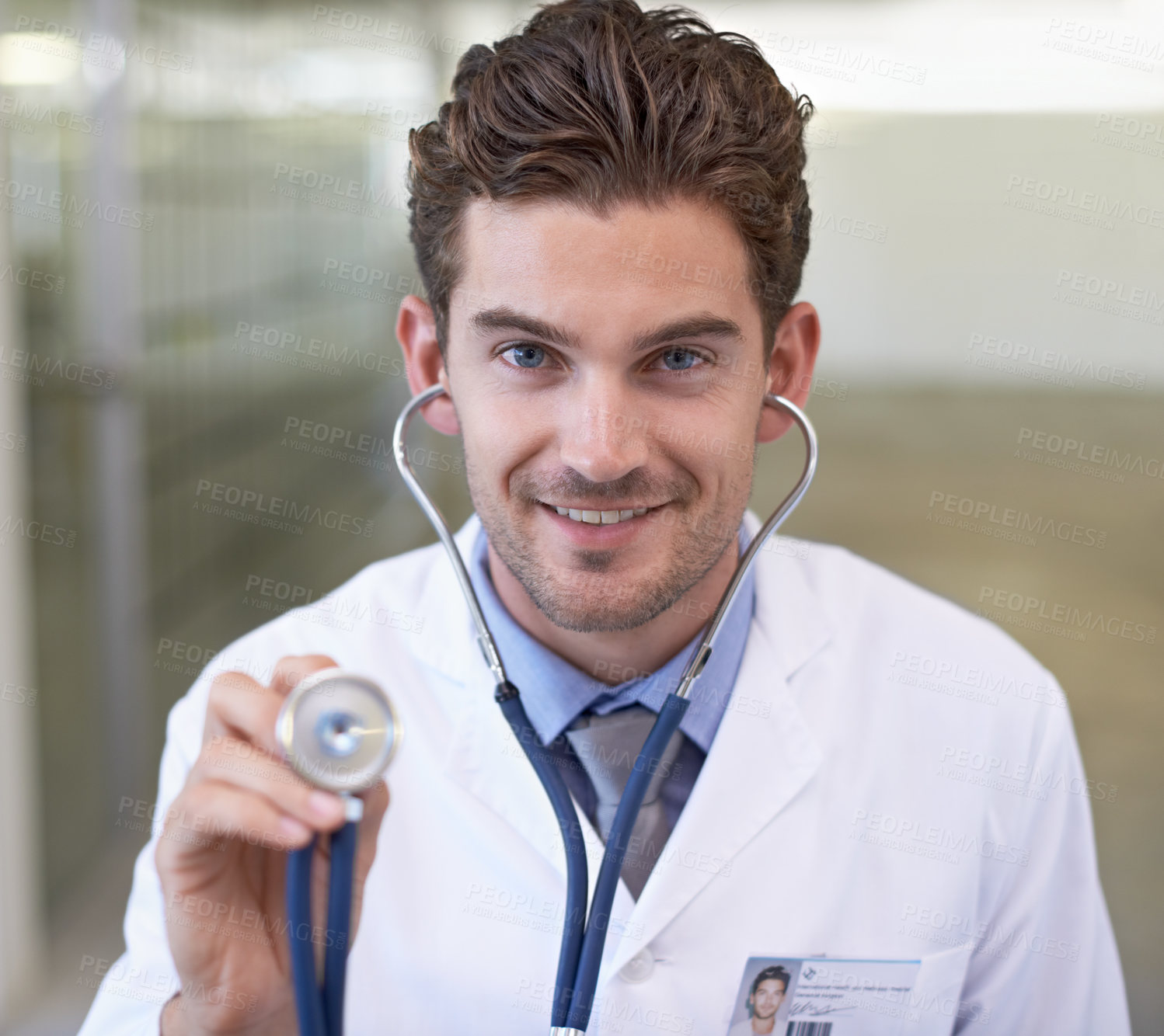 Buy stock photo Cropped shot of a handsome young doctor