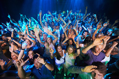 Buy stock photo Dance, music and party with audience at concert for rock, festival or disco with live band performance. Celebration, social and nightclub show with crowd of fans listening for  rave or new year event