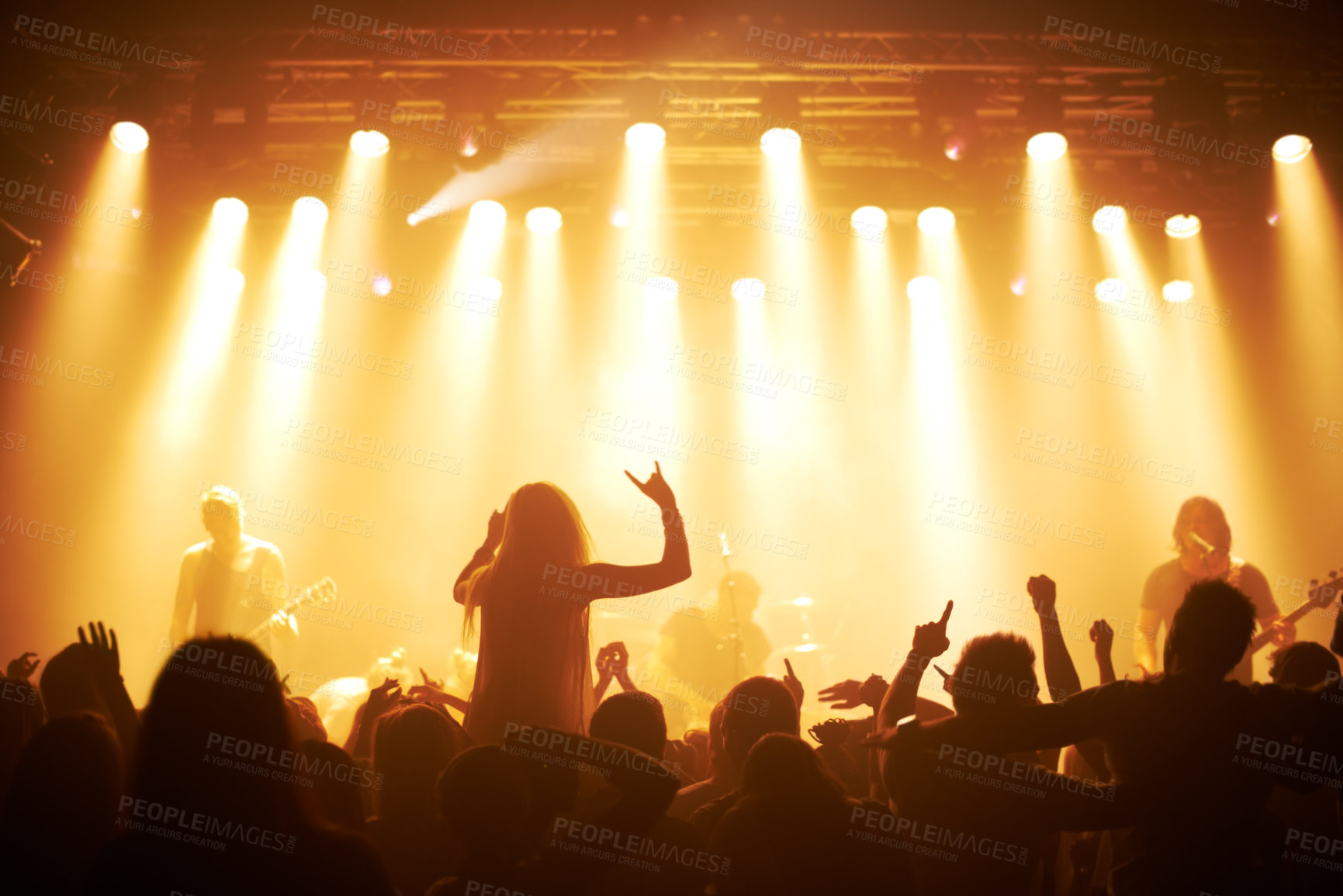 Buy stock photo Rear view of a crowd cheering at a concert- This concert was created for the sole purpose of this photo shoot, featuring 300 models and 3 live bands. All people in this shoot are model released