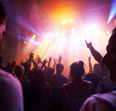 Buy stock photo Crowd, stage lights and live band music in party event, nightclub festival or dance floor concert. People, musicians and audience dancing in spotlight social disco, techno rave or rock entertainment