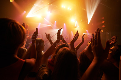 Buy stock photo Music rock festival, concert or performance event with audience, crowd or people hands dancing with fans, youth and friends. Group of people at a techno, disco rave or night party club in celebration