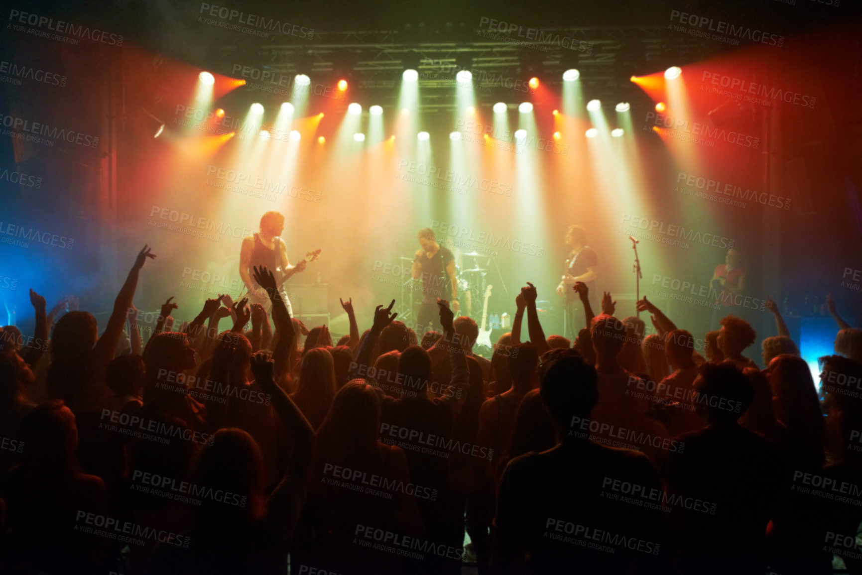Buy stock photo Rock, band and crowd of people at concert for stage performance, party dance and new year or holiday festival in dark. Dancing, singing and celebrity or musician with night club music for an audience