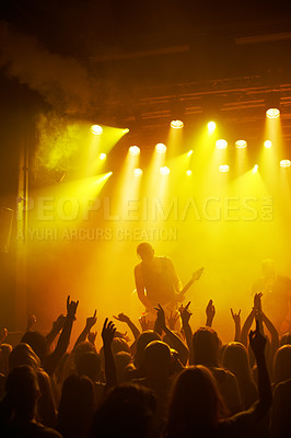 Buy stock photo Rear-view of a cheering crowd at a music concert- This concert was created for the sole purpose of this photo shoot, featuring 300 models and 3 live bands. All people in this shoot are model released