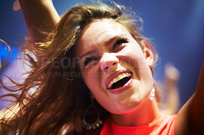 Buy stock photo Dance, music and happy with woman at concert for party, nightclub and festival dj event. Disco, rock and freedom with girl dancing in crowd of fans for celebration, energy and techno performance