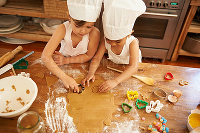 Buy stock photo Family, baking and children learning to shape cookies at a table, development and bond in a kitchen. Cake, cutter and boy kids having fun while making biscuits, playing and being creative with flour