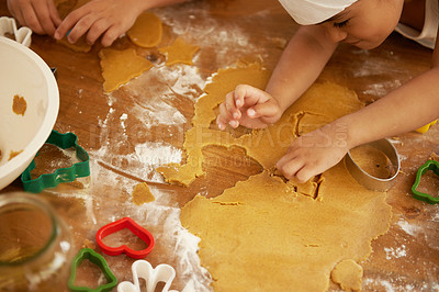 Buy stock photo Christmas, cookies and child hands in the kitchen making food at home for the holiday. Youth baker, kids and house activity of a kid hand with cooking and bakery baking dough with flour for family