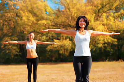 Buy stock photo Fitness, stretching and women in a park for yoga, balance or mental health wellness outdoor. Spiritual, healing and friends with arm stretch in a forest for flexibility, posture or breathing in nature